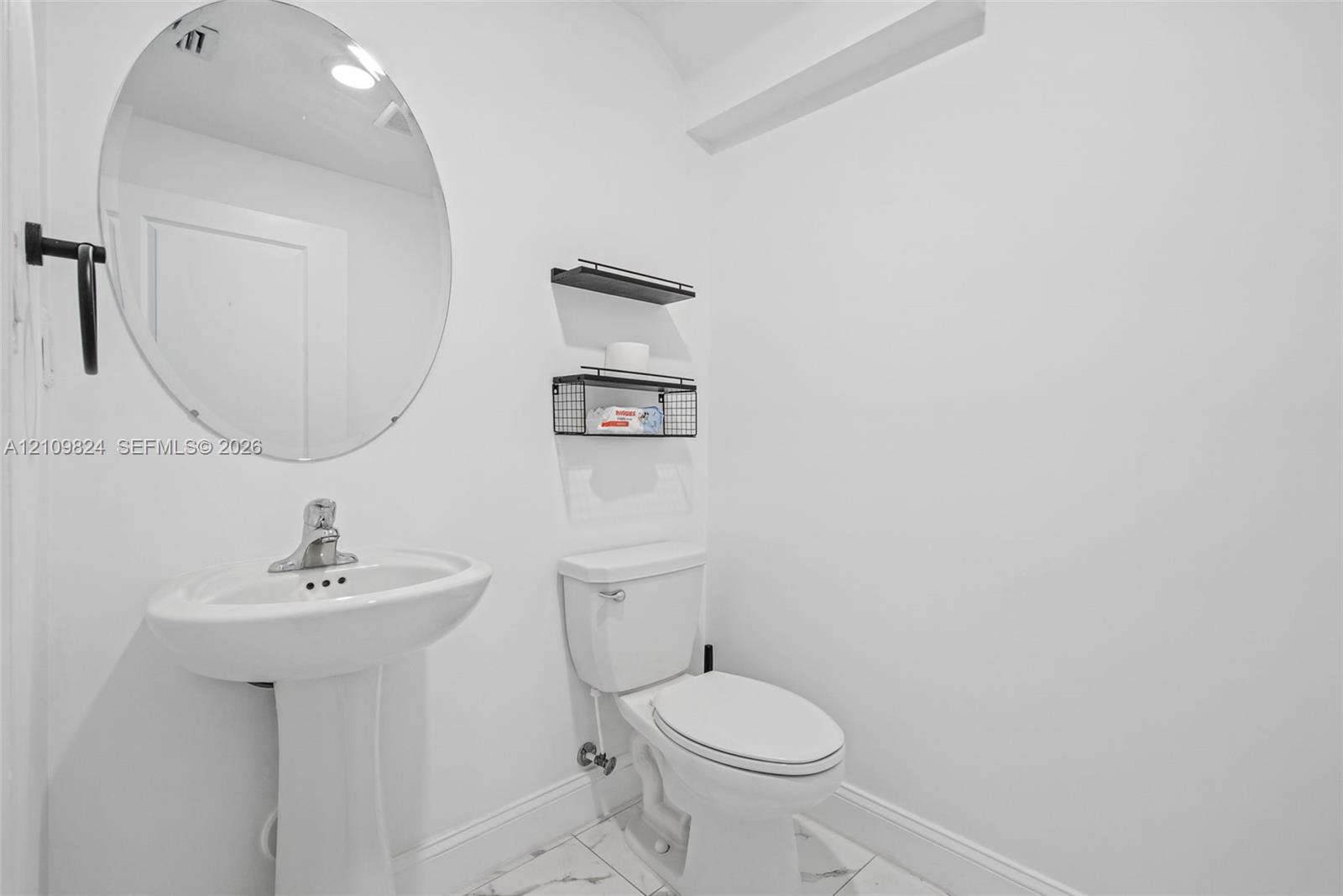 Half bath on first floor Half bath on first floor