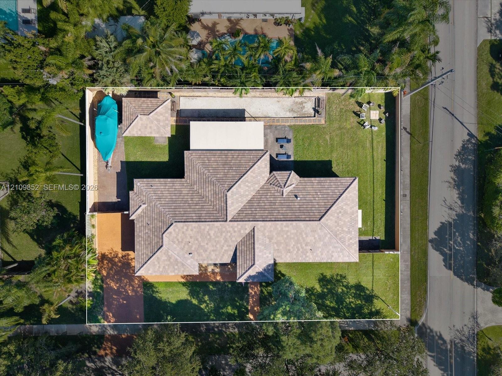 Another aerial perspective * note the bocce court and plenty of room for a future pool *