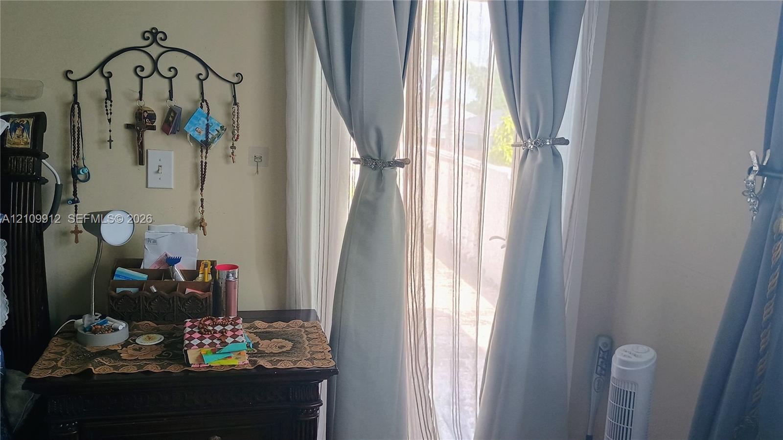 Floor-to-ceiling window featuring glass paneled door and natural light exposure
