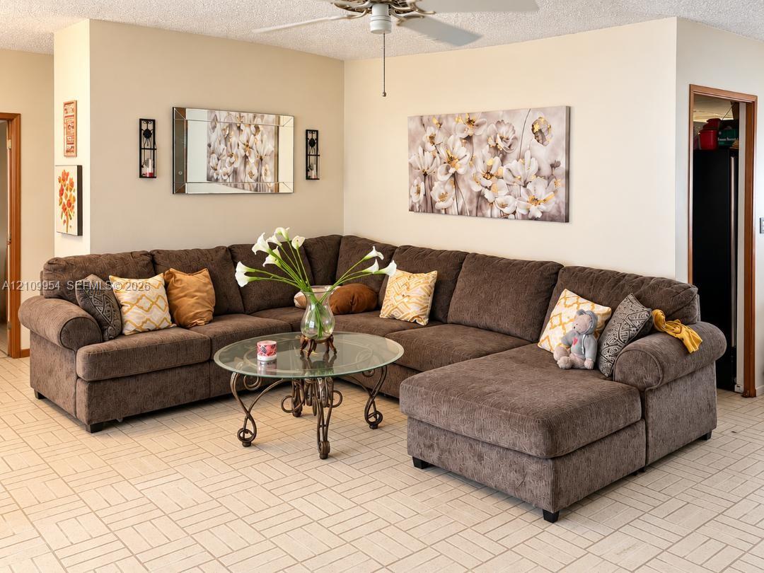 Ceramic tile flooring and ceiling-mounted fan Ceramic tile flooring and ceiling-mounted fan