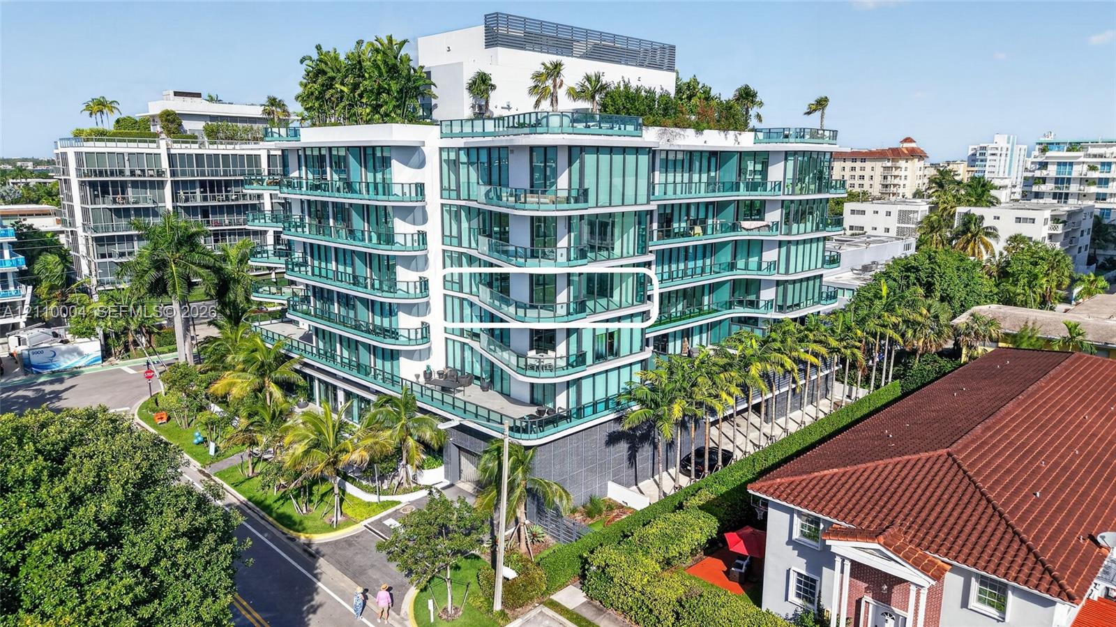 High-rise exterior featuring floor-to-ceiling glass windows