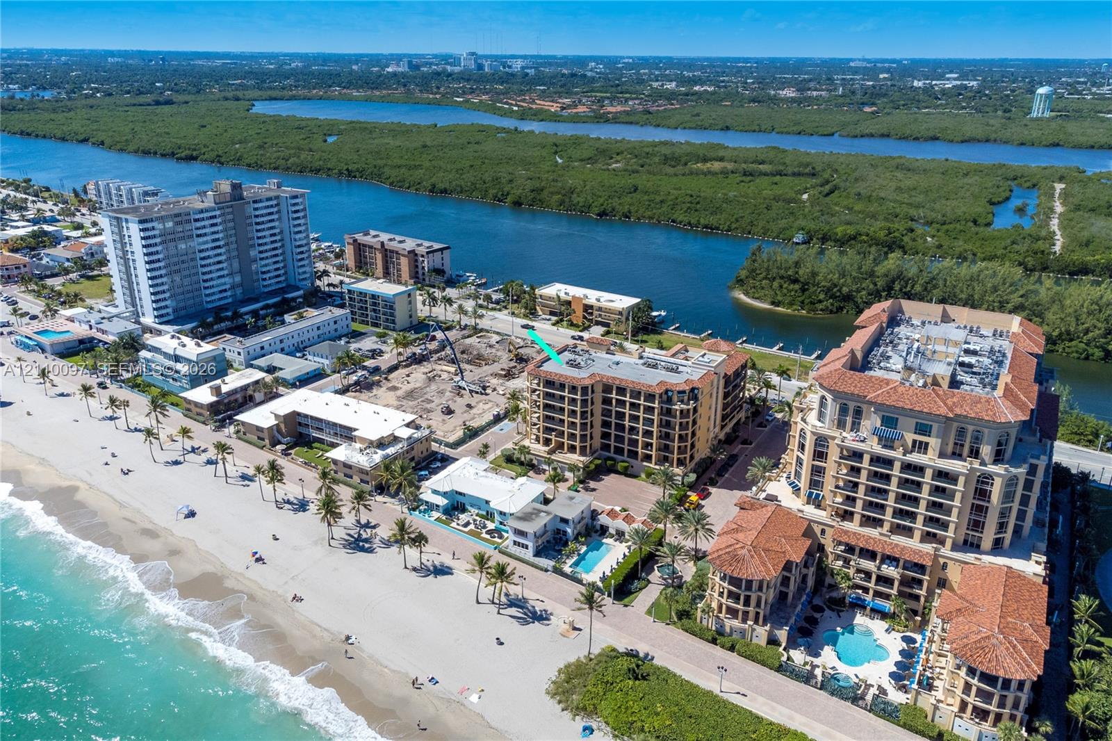 Aerial perspective featuring proximity to the coastline, waterfront access, and surrounding coastal landscape Aerial perspective featuring proximity to the coastline, waterfront access, and surrounding coastal landscape