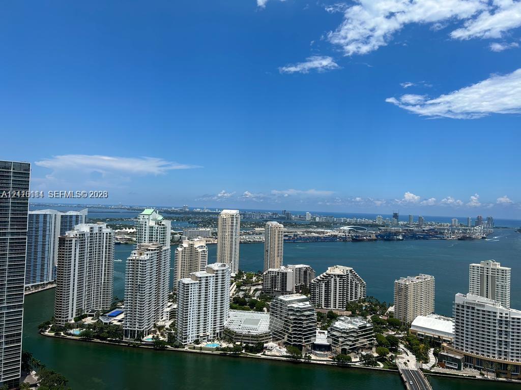 High-altitude perspective featuring expansive water frontage, coastal scenery, and a panoramic urban skyline High-altitude perspective featuring expansive water frontage, coastal scenery, and a panoramic urban skyline