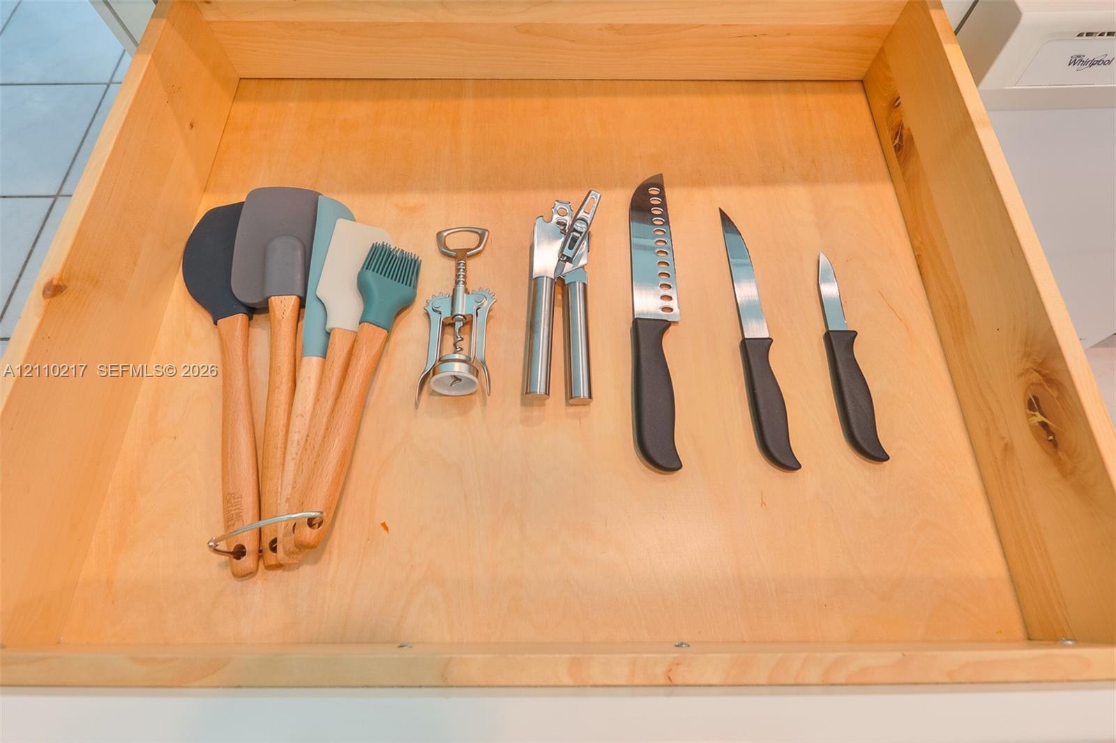Natural wood-finish drawer featuring smooth construction