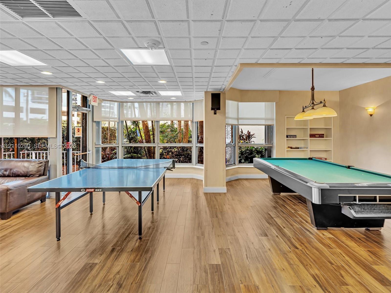 Comfortable TV Lounge and Game Room for Entertainment and Socializing