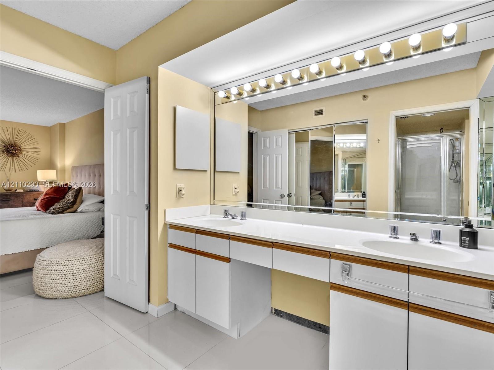 Dual vanity and separate bath tub and shower