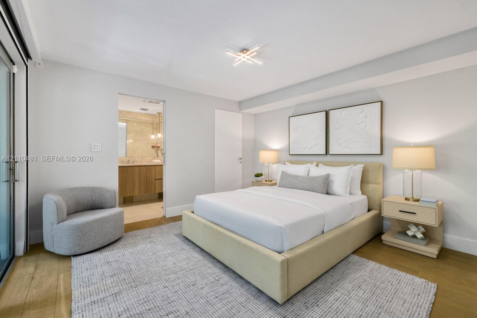 Wood-finish flooring, sliding glass door, and flush-mount geometric ceiling lighting