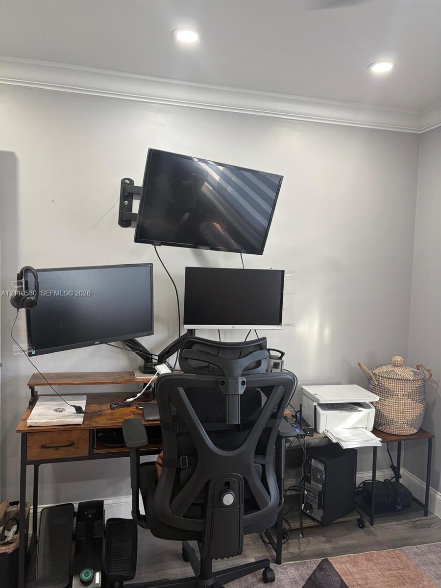 Wall-mounted television bracket and recessed ceiling lighting