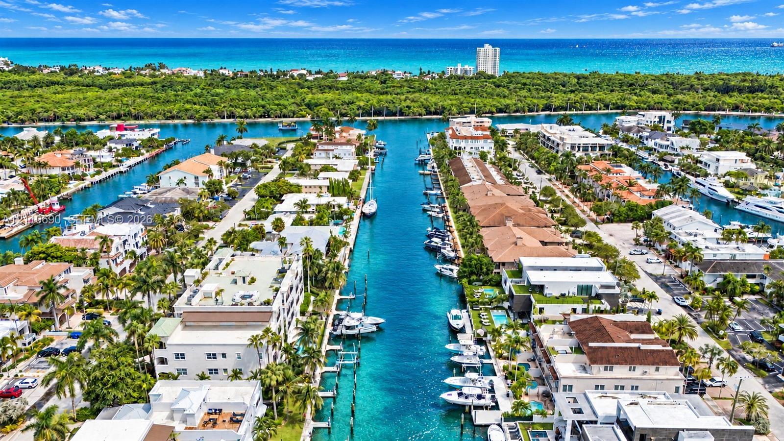 Waterfront community featuring pristine canals with private boat docking, lush tropical landscaping throughout the neighborhood, Mediterranean and contemporary architectural styles, and direct water access to navigable waterways Waterfront community featuring pristine canals with private boat docking, lush tropical landscaping throughout the neighborhood, Mediterranean and contemporary architectural styles, and direct water access to navigable waterways