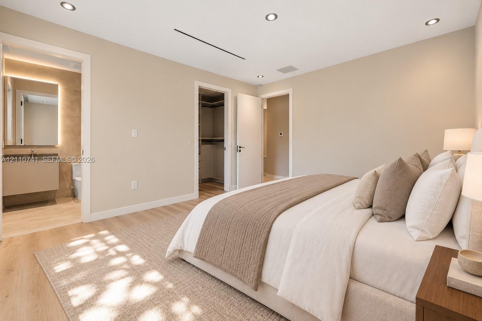 bedroom with en-suite, virtually staged for illustrative purposes