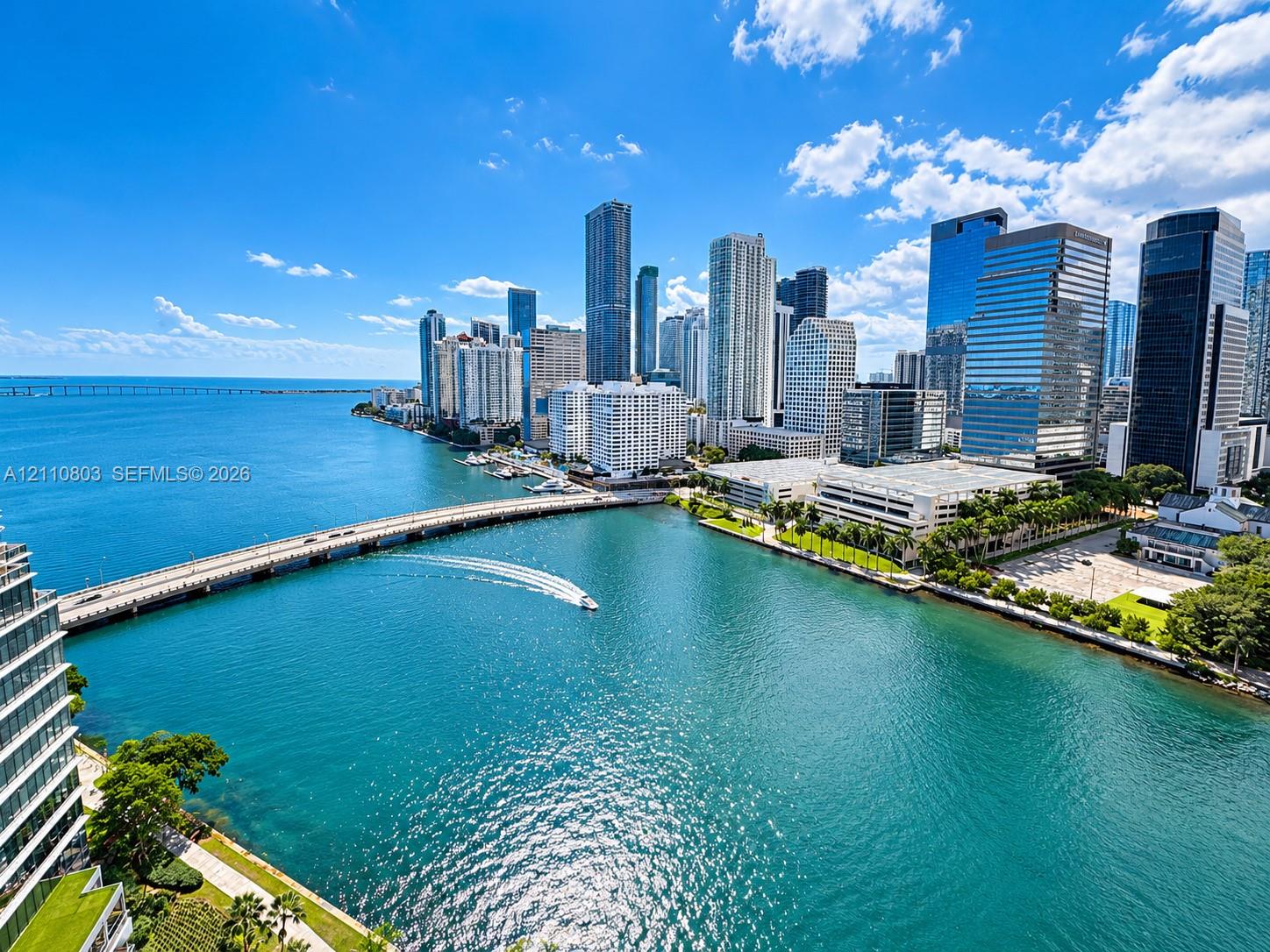 Aerial perspective featuring direct water frontage, a panoramic cityscape backdrop, and proximity to major thoroughfares Aerial perspective featuring direct water frontage, a panoramic cityscape backdrop, and proximity to major thoroughfares