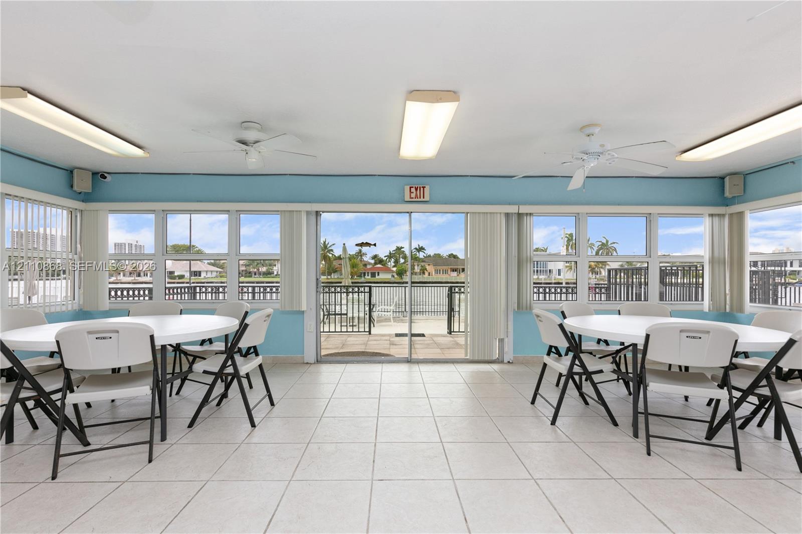 Club house with tile flooring overlooking the intercoastal waterways.