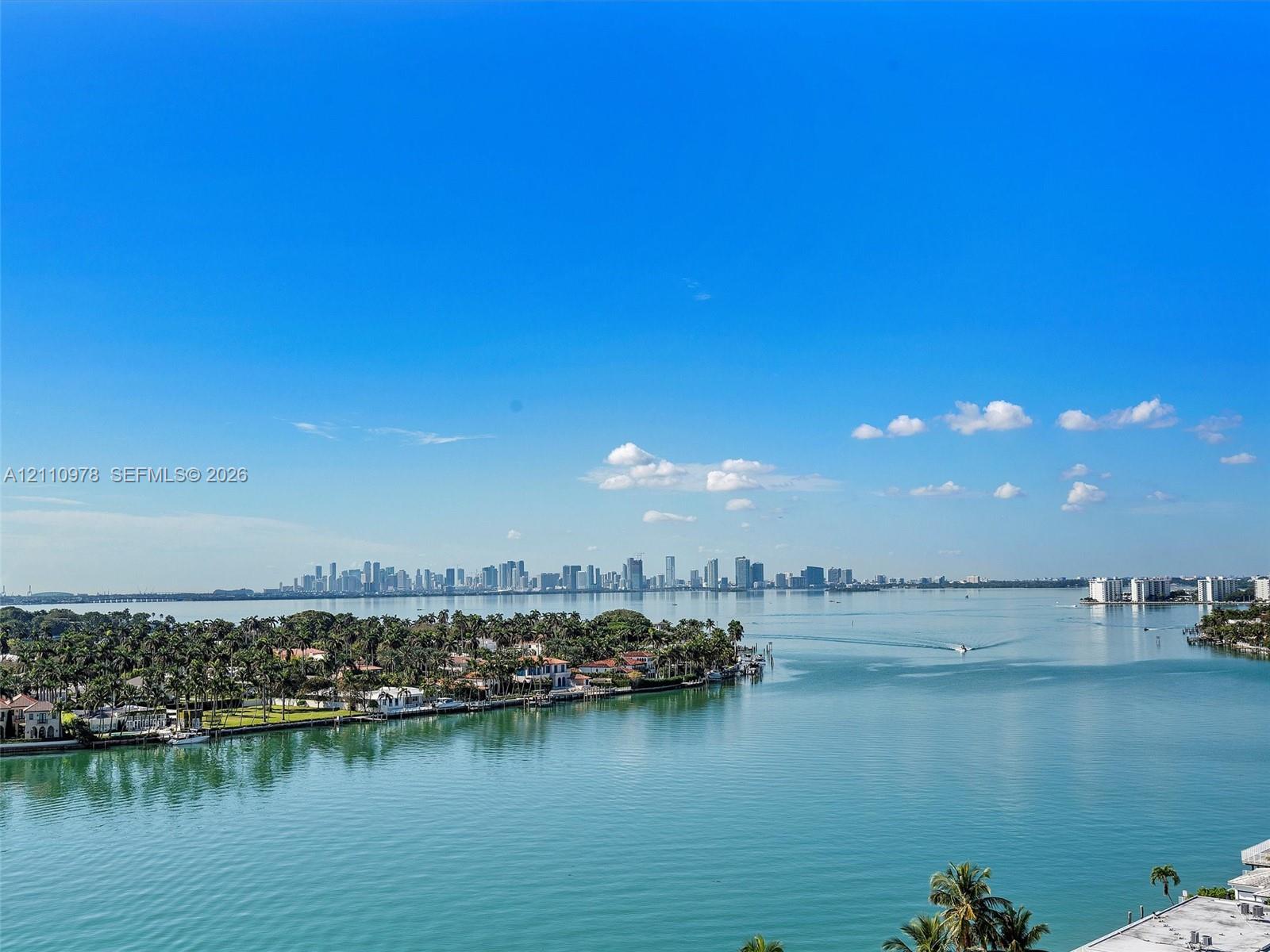 Panoramic water scenery featuring a skyline backdrop and coastal landscape