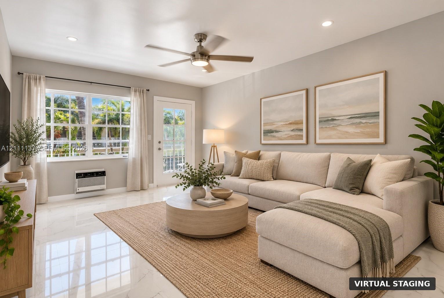 Living area featuring polished stone-finish flooring, recessed lighting, a ceiling fan with integrated light fixture, large multi-pane windows, and a glass-paneled exterior door Living area featuring polished stone-finish flooring, recessed lighting, a ceiling fan with integrated light fixture, large multi-pane windows, and a glass-paneled exterior door