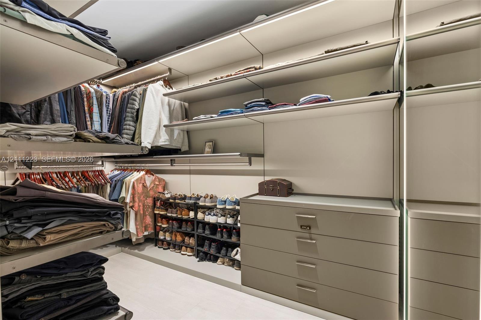 Den converted into custom walk-in closet for primary