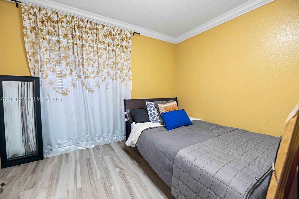 Wood-finish flooring and crown molding