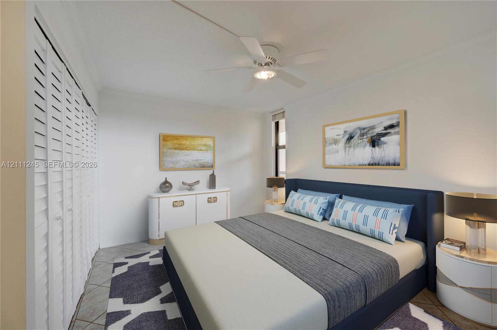 Bedroom featuring tile flooring, white louvered-style closet doors, and a ceiling-mounted light fixture with fan