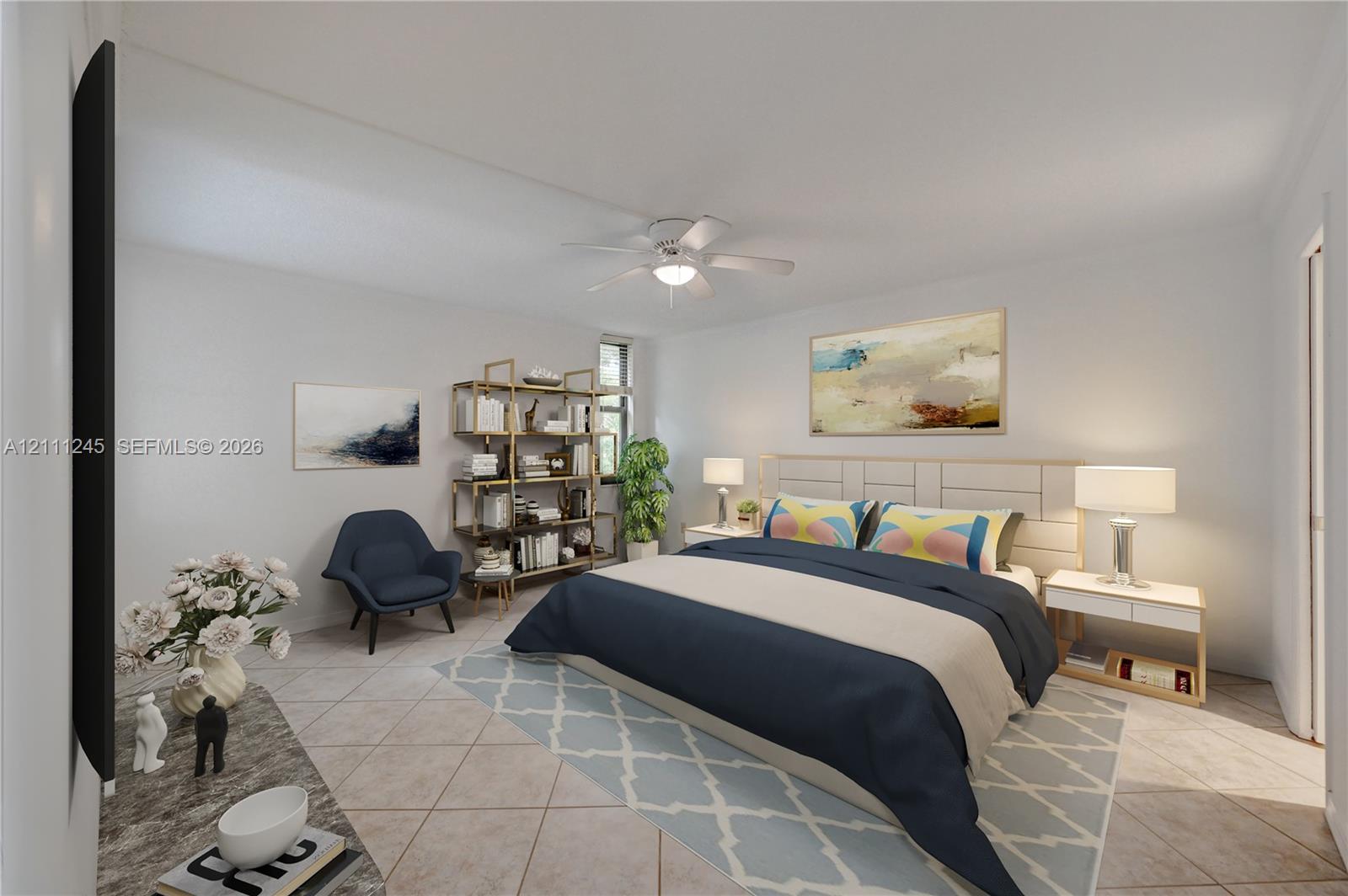 Spacious room featuring neutral tile flooring, a centered ceiling fan with integrated lighting, and a window