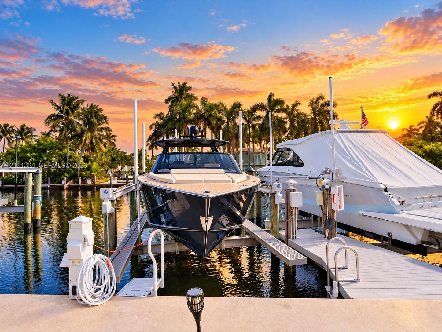 Private deep-water dock featuring multiple motorized boat lifts and integrated piling systems