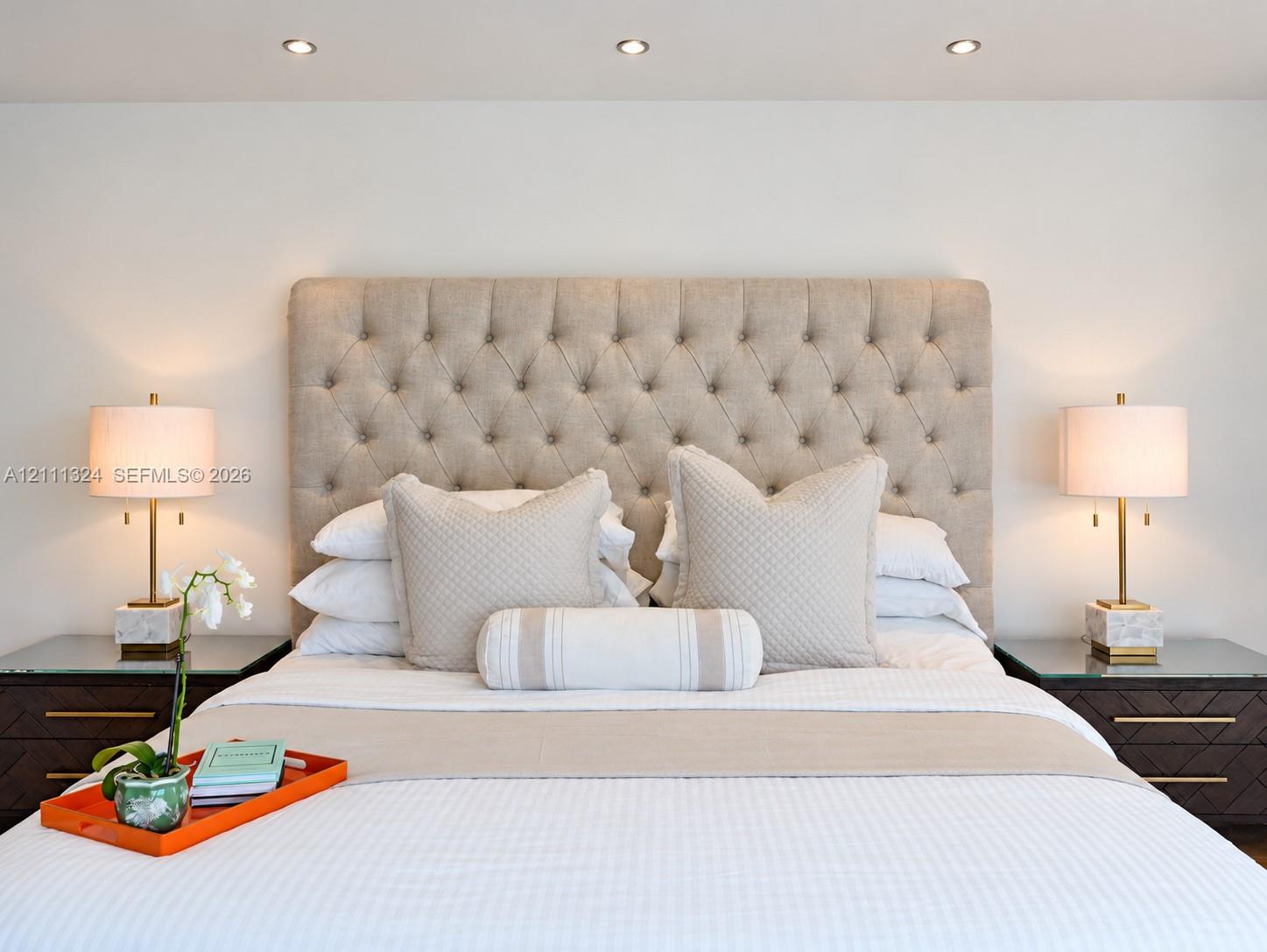Recessed ceiling lighting featuring a neutral wall finish