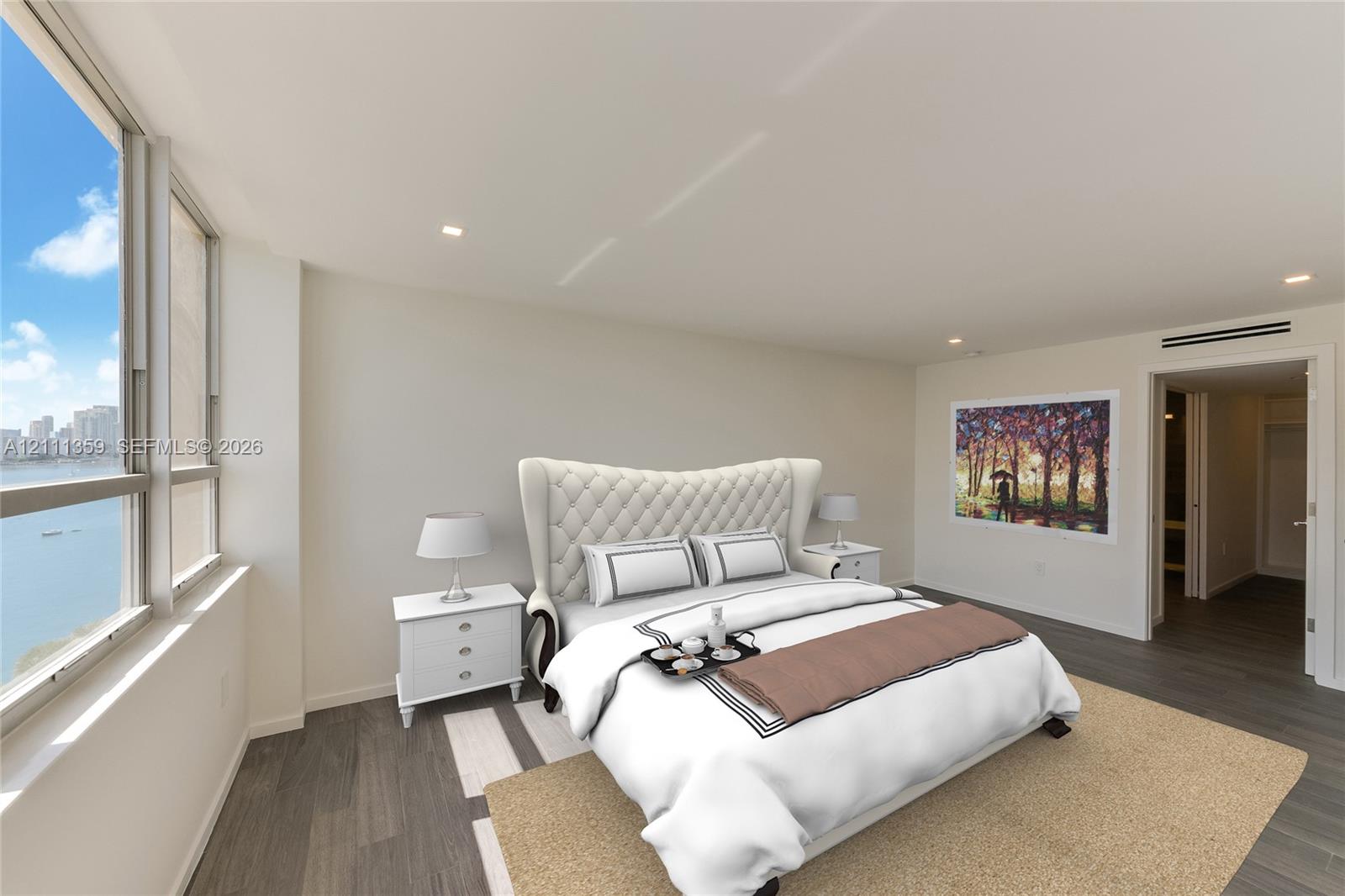 Floor-to-ceiling windows, wood-finish flooring, recessed lighting, and wall-mounted climate control unit