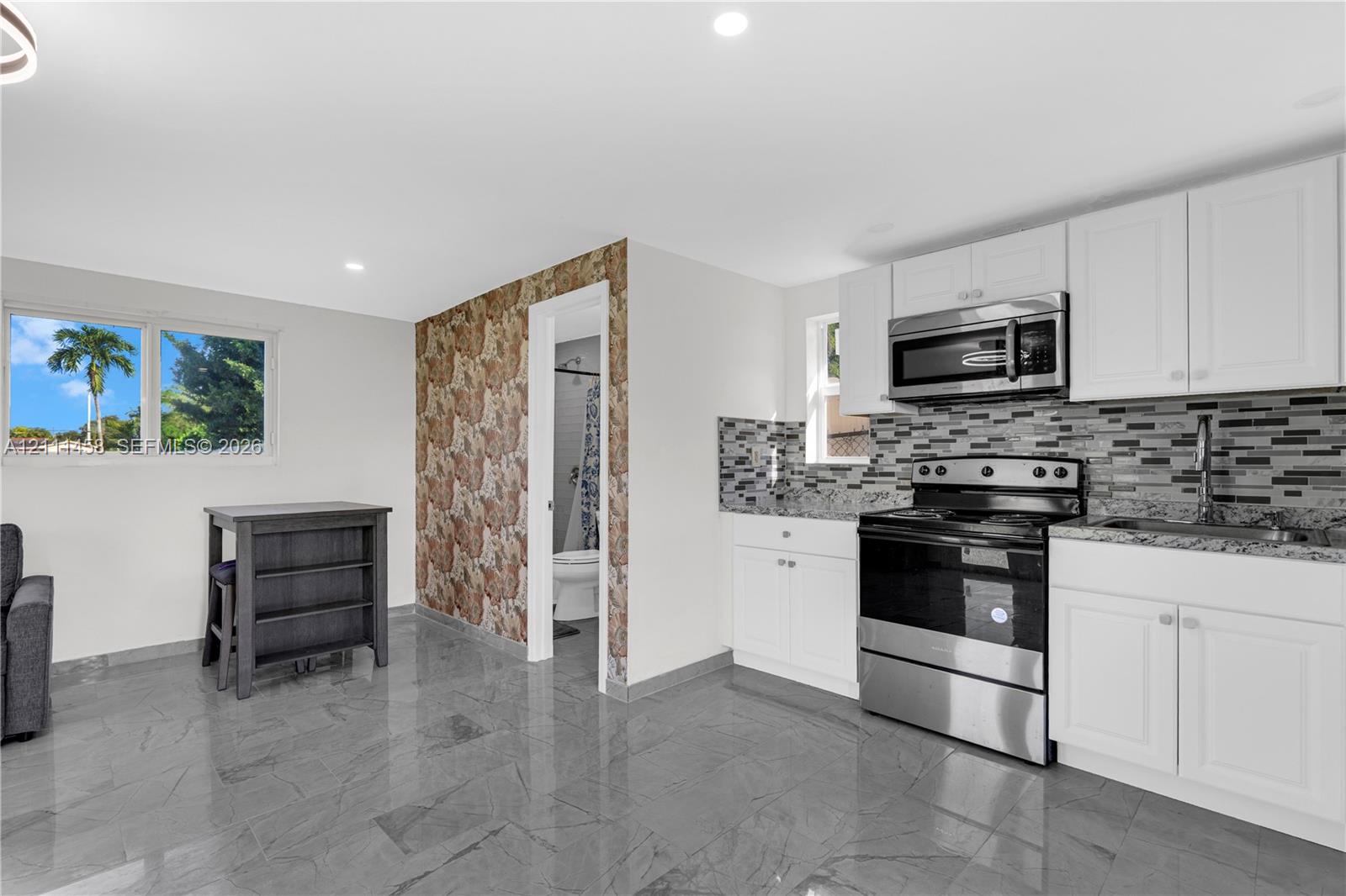 Kitchen featuring white