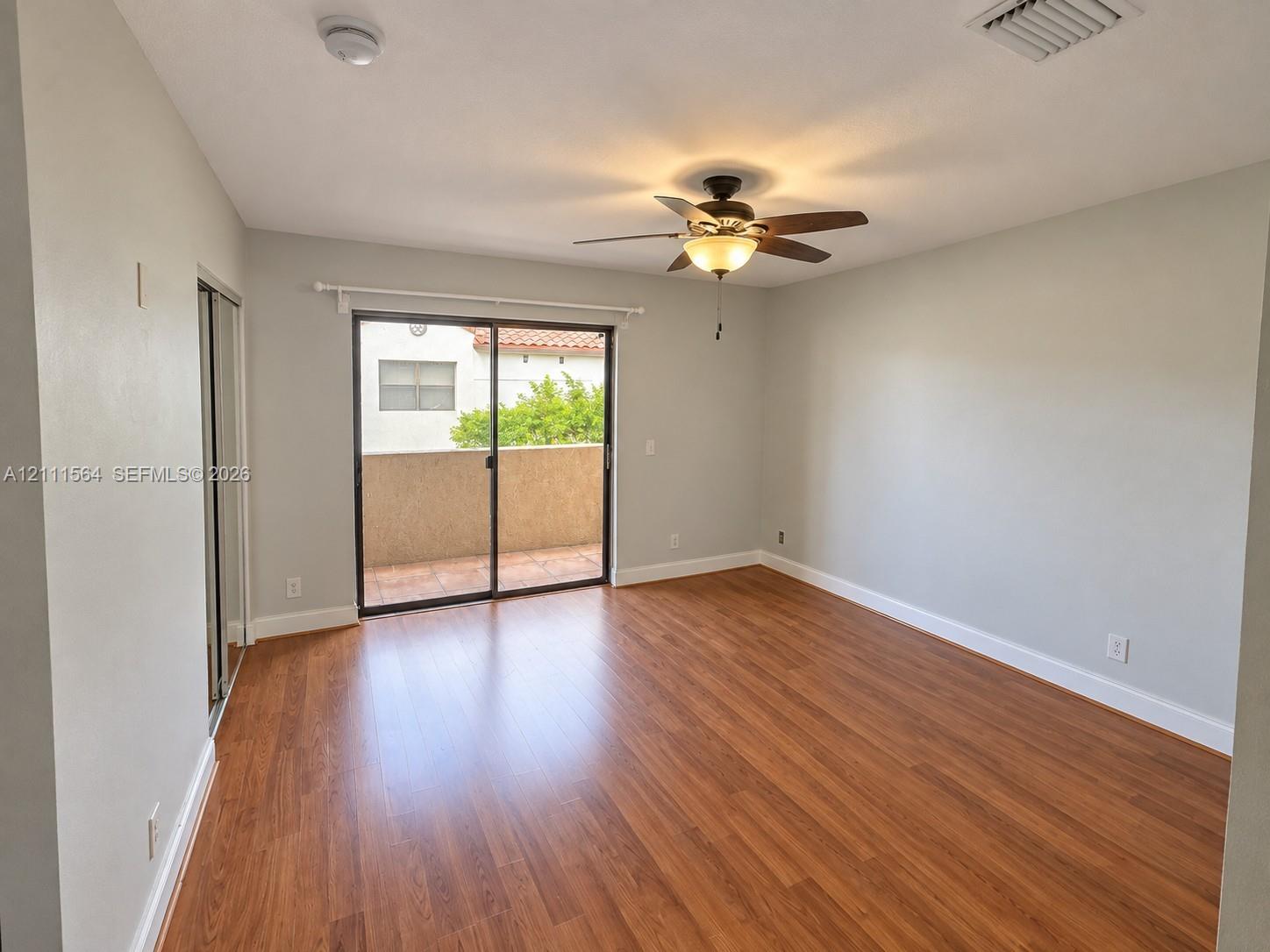 Primary Bedroom w/ Balcony (Upstairs)
