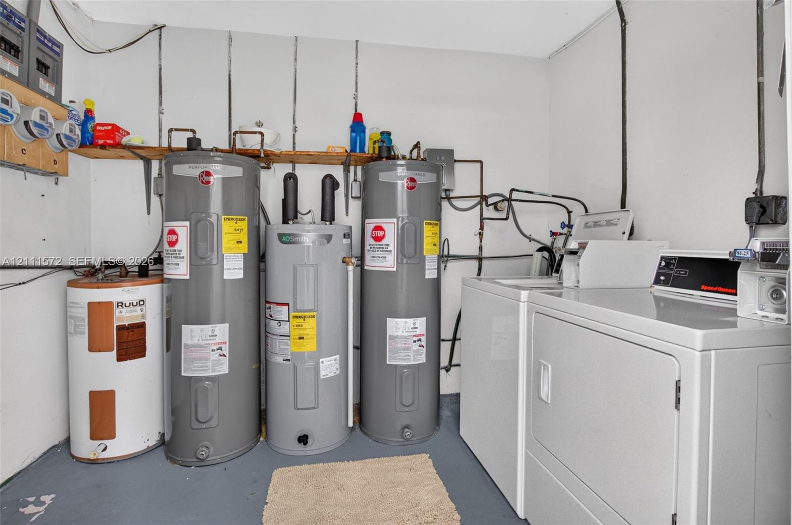 Laundry room shared by 4 units if you don't install your own W/D. Bonus that your water heater won't flood your unit!
