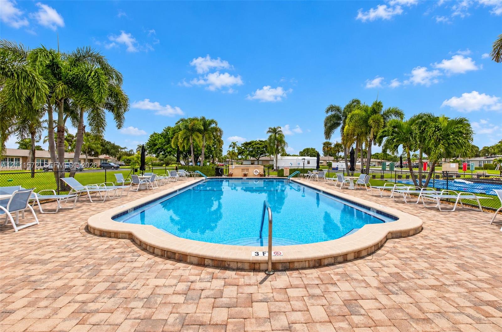 In-ground heated swimming pool