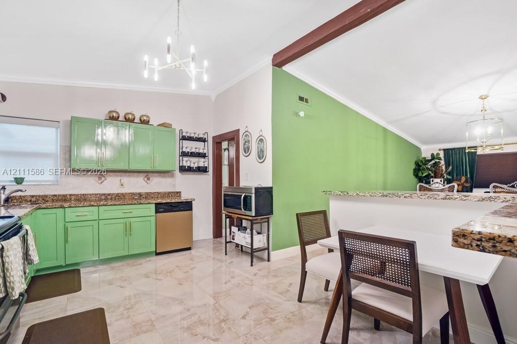 Kitchen featuring stone countertops, a multi-arm chandelier, polished tile flooring, and an exposed structural ceiling beam