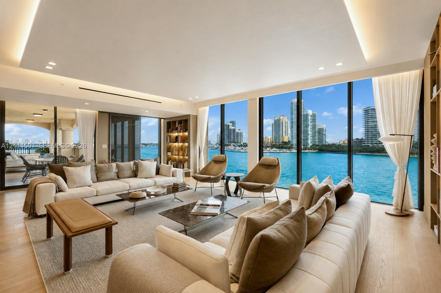 Floor-to-ceiling glass windows, recessed cove lighting, built-in floor-to-ceiling shelving, and wood-finish flooring Floor-to-ceiling glass windows, recessed cove lighting, built-in floor-to-ceiling shelving, and wood-finish flooring