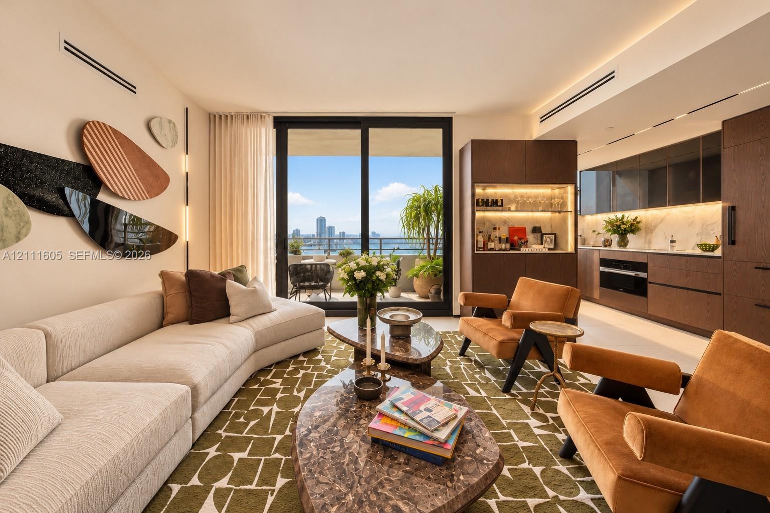 Open-concept living space featuring floor-to-ceiling sliding glass doors, built-in dark wood cabinetry with integrated lighting, stone-surface backsplash, and recessed ceiling lighting