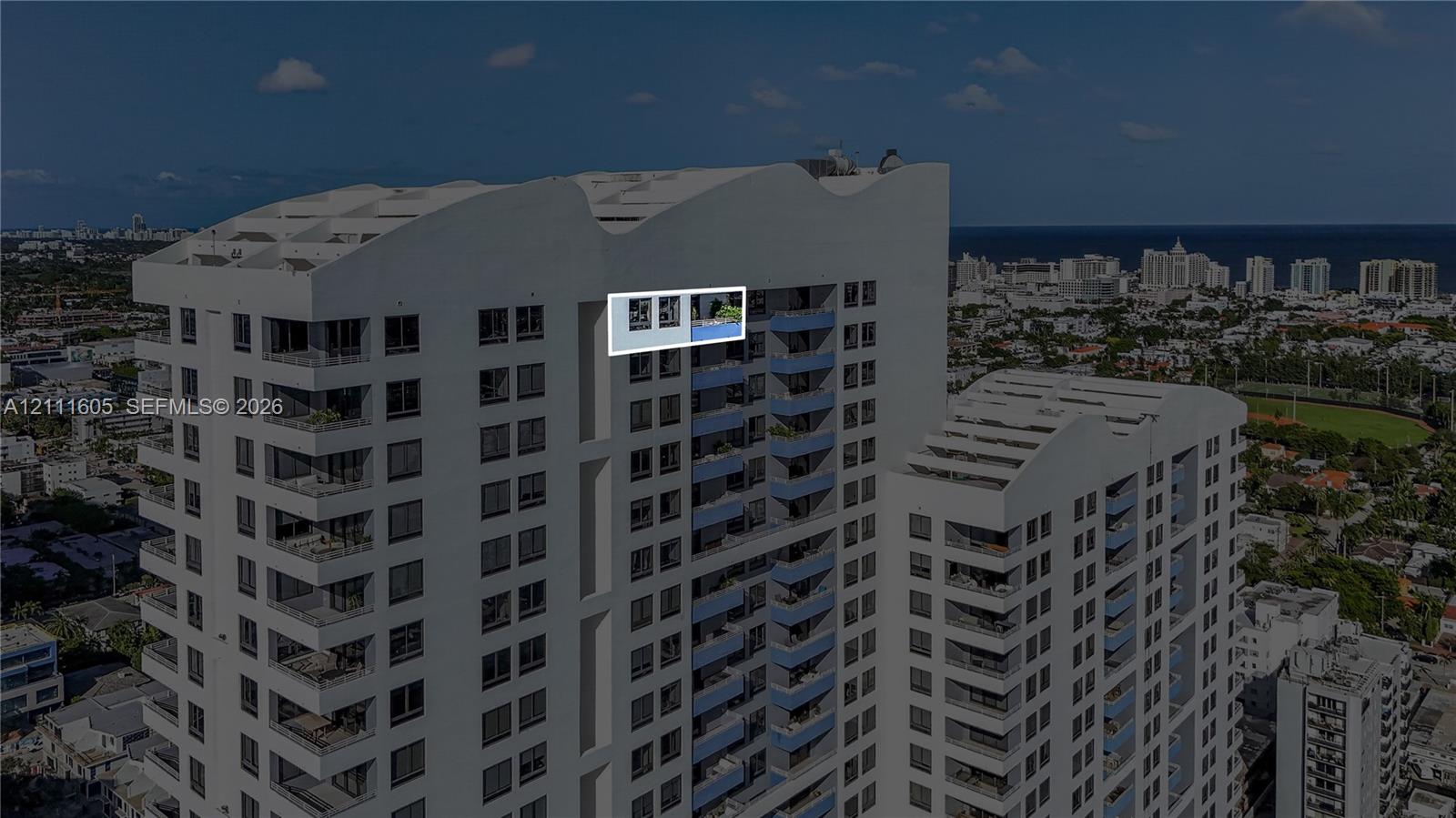 High-rise residential exterior featuring a private cantilevered balcony with a built-in plunge pool