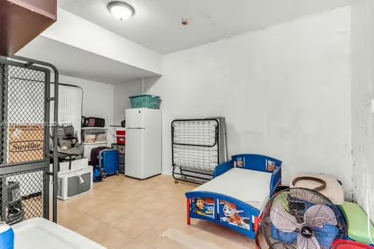 Tile flooring and flush-mount ceiling lighting