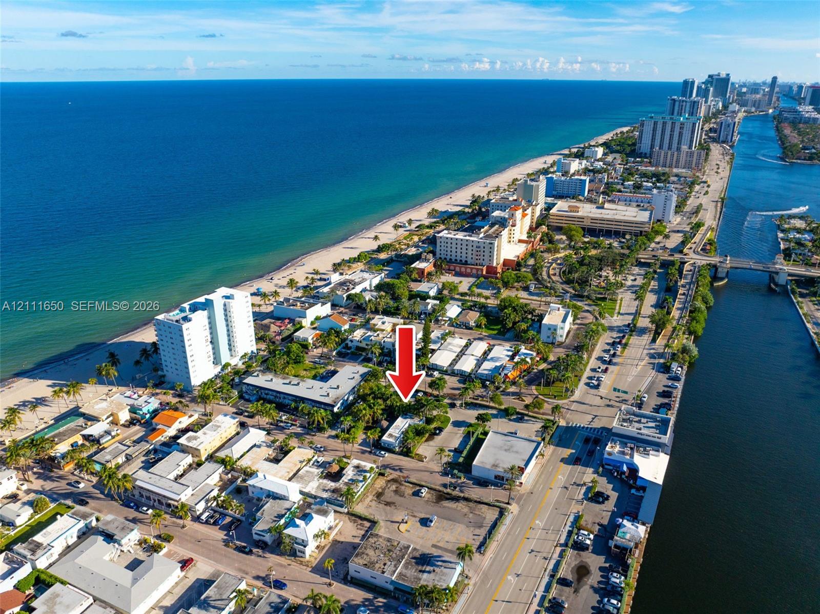 Aerial perspective of a coastal property featuring proximity to the Atlantic Ocean and a salt-water canal