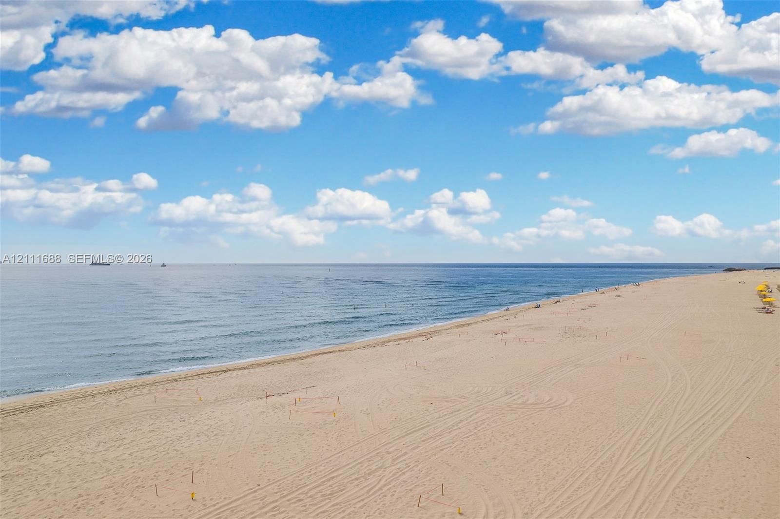 Sandy beachfront property featuring direct shoreline access and expansive ocean scenery
