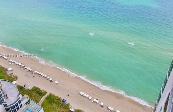 Direct oceanfront exposure featuring expansive Atlantic Ocean scenery and immediate sand beach access Direct oceanfront exposure featuring expansive Atlantic Ocean scenery and immediate sand beach access