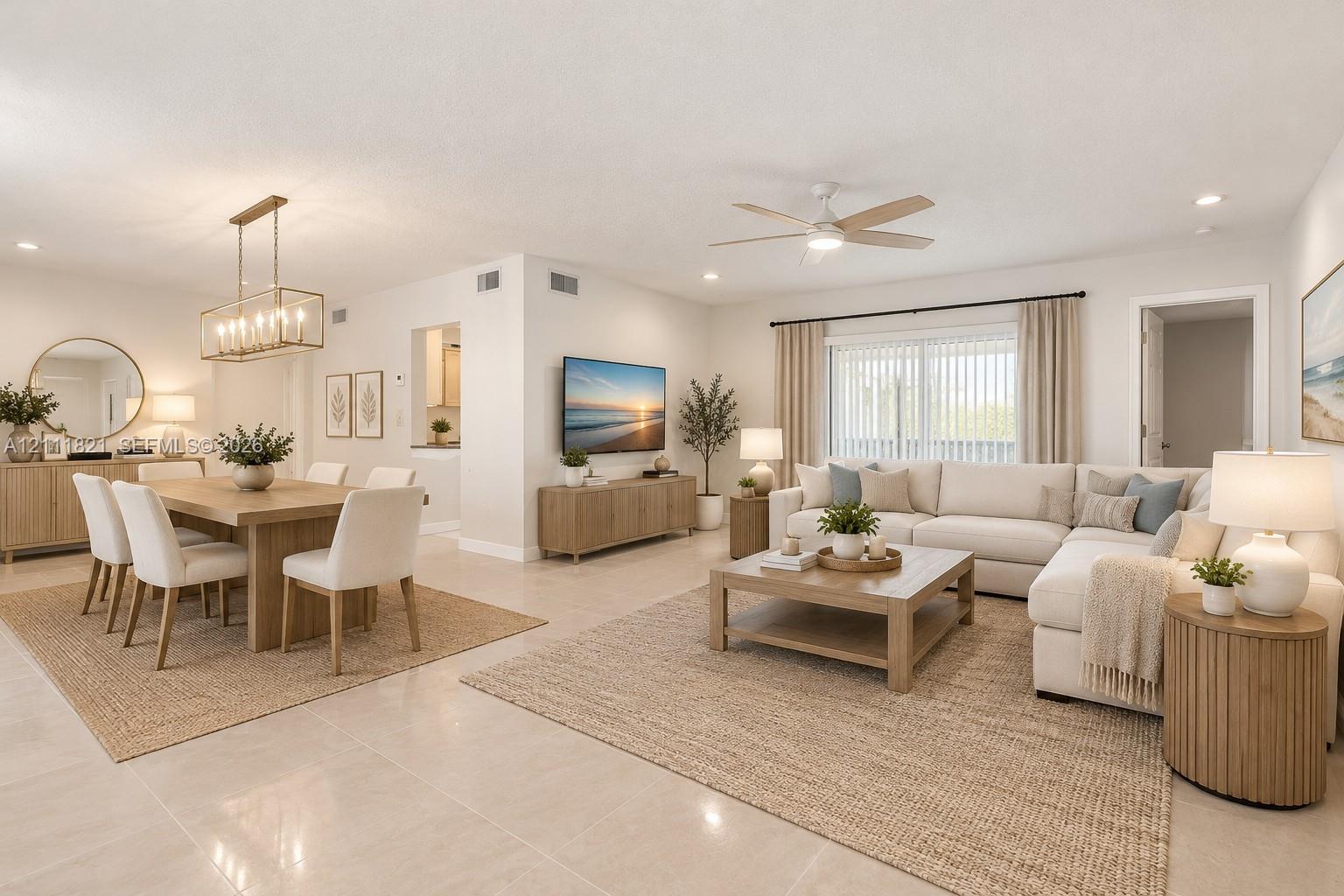 Open-concept living and dining area virtually staged
