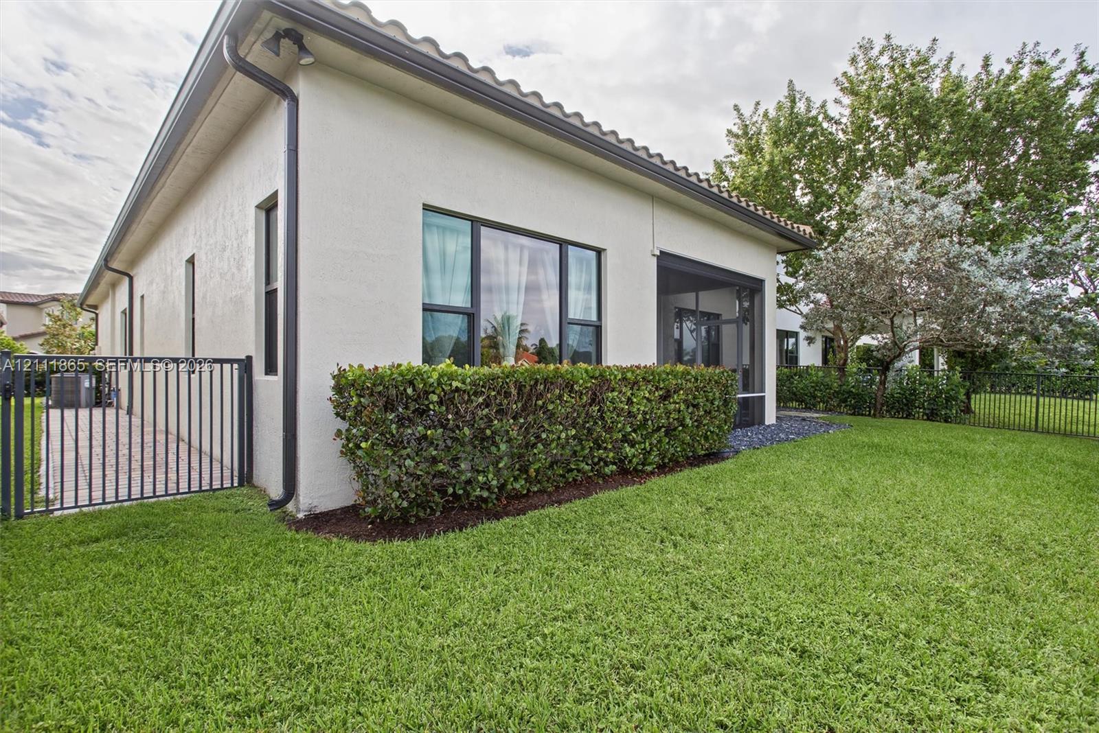 Nicely manicured rear view of home