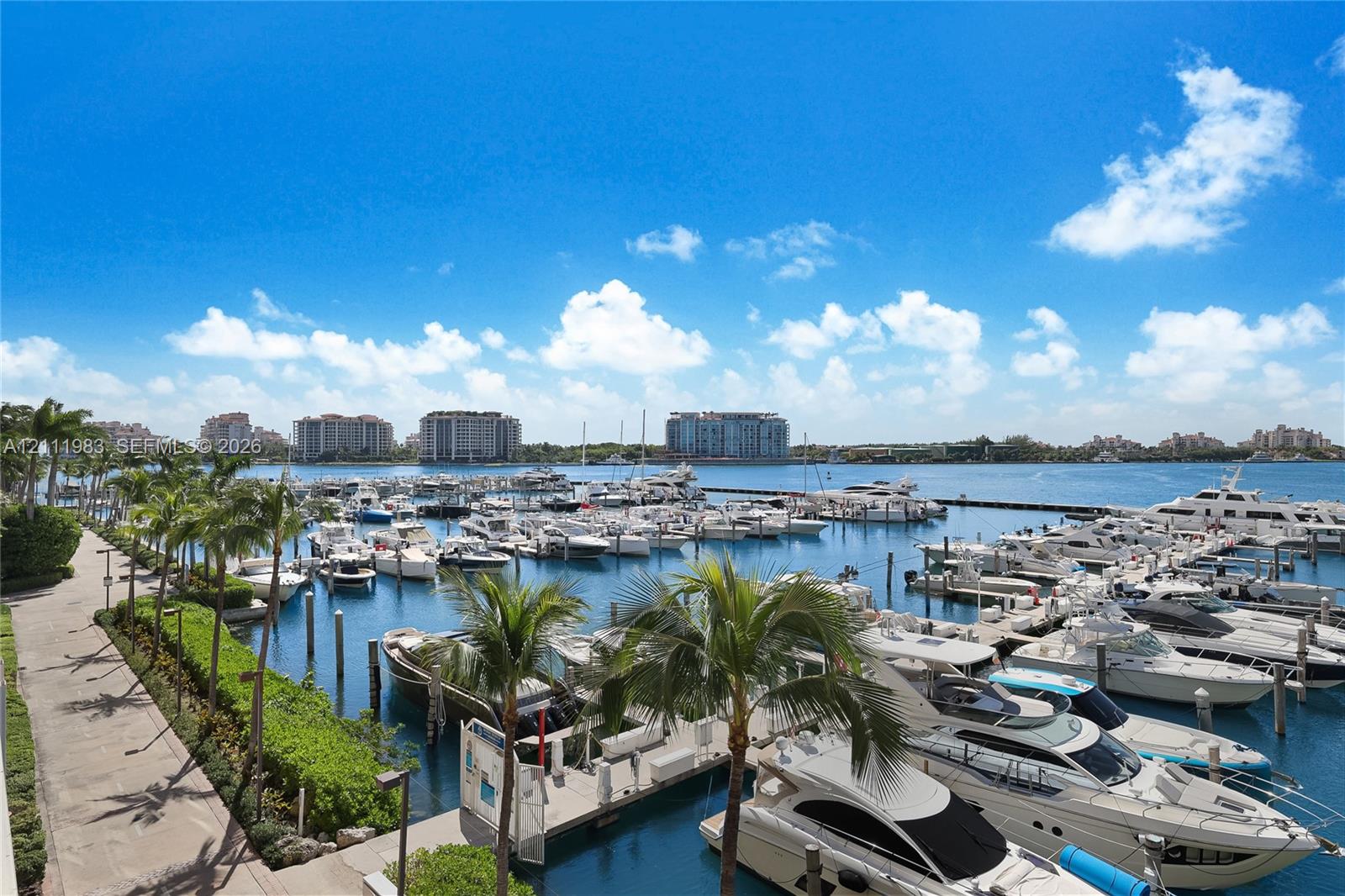 Boardwalk along marina, Fisher Island and bay view