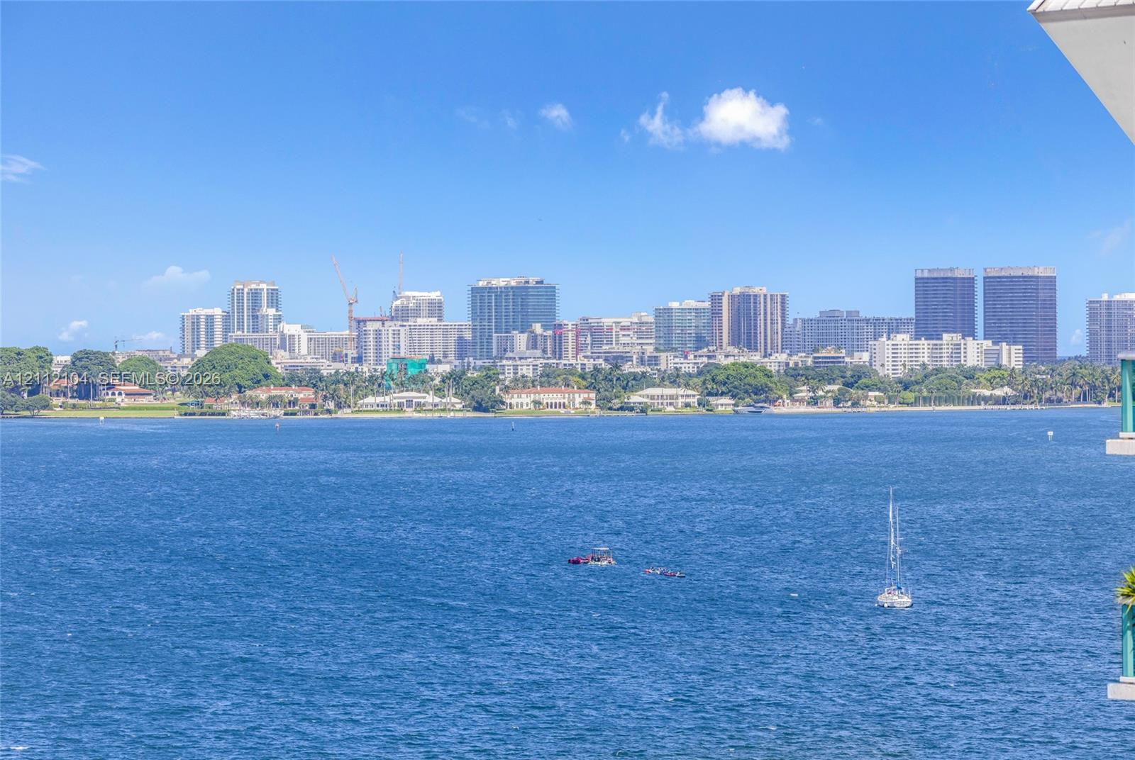 Waterfront perspective of the open bay and city skyline