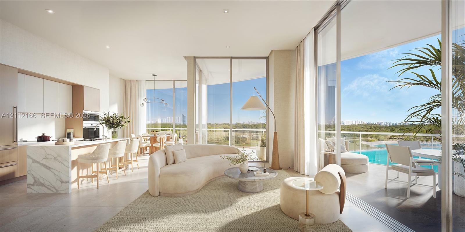 Open-concept interior featuring floor-to-ceiling glass sliding doors, stone-finish kitchen island, recessed lighting, and balcony access