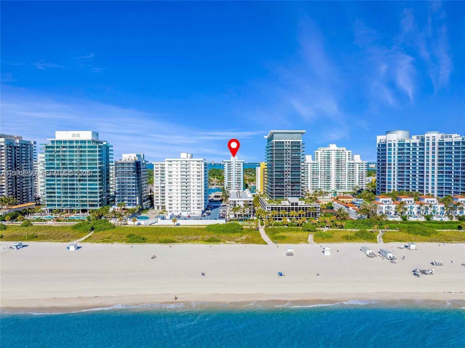 High-rise residential building with direct beachfront access and coastal location