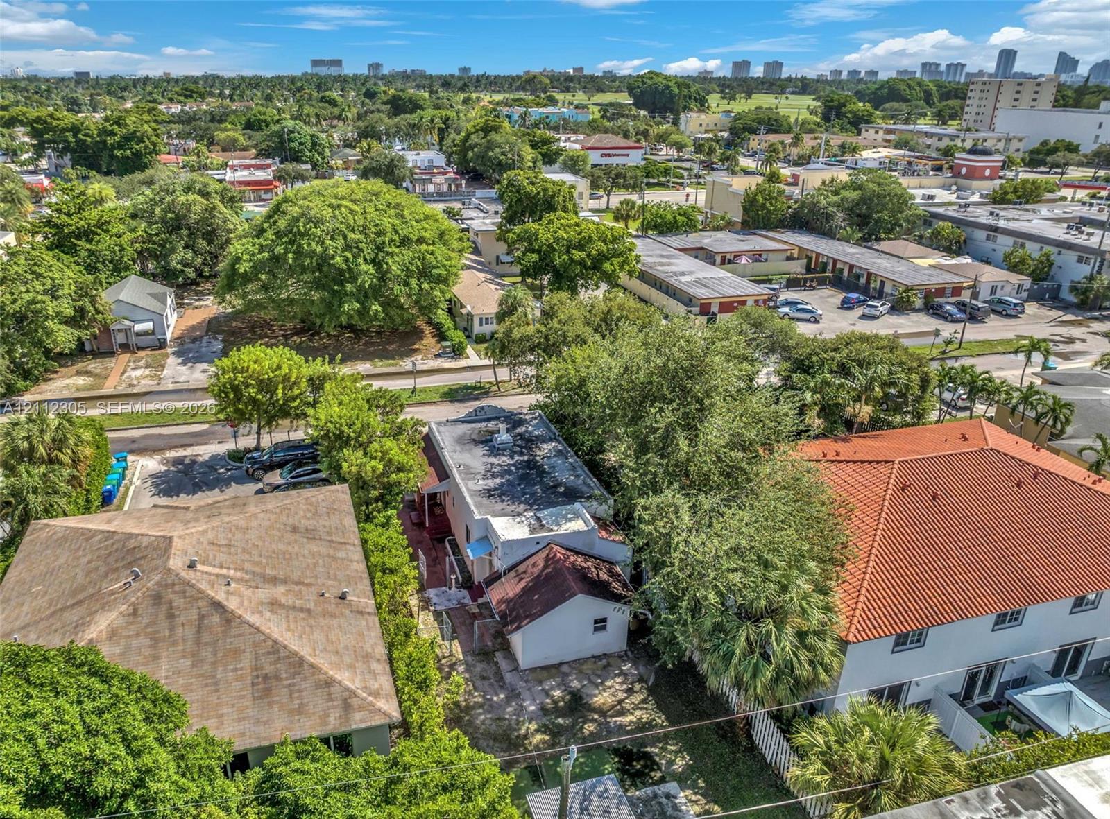 Aerial view of the property and the surrounding neighborhood.