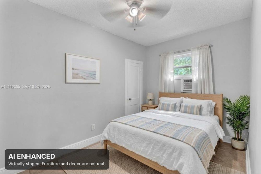 Virtually staged (AI). Furniture and decor are not real. The unaltered original is the previous photo.
