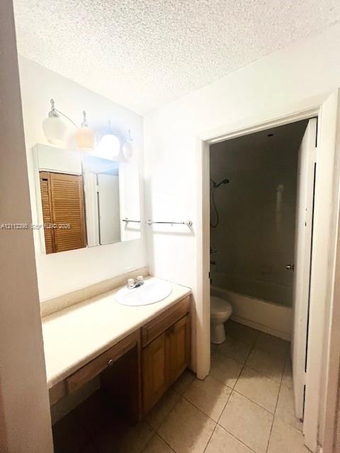 Vanity featuring a rectangular countertop, integrated oval sink, wood-finish cabinetry, tri-light fixture, and wall-mounted mirror