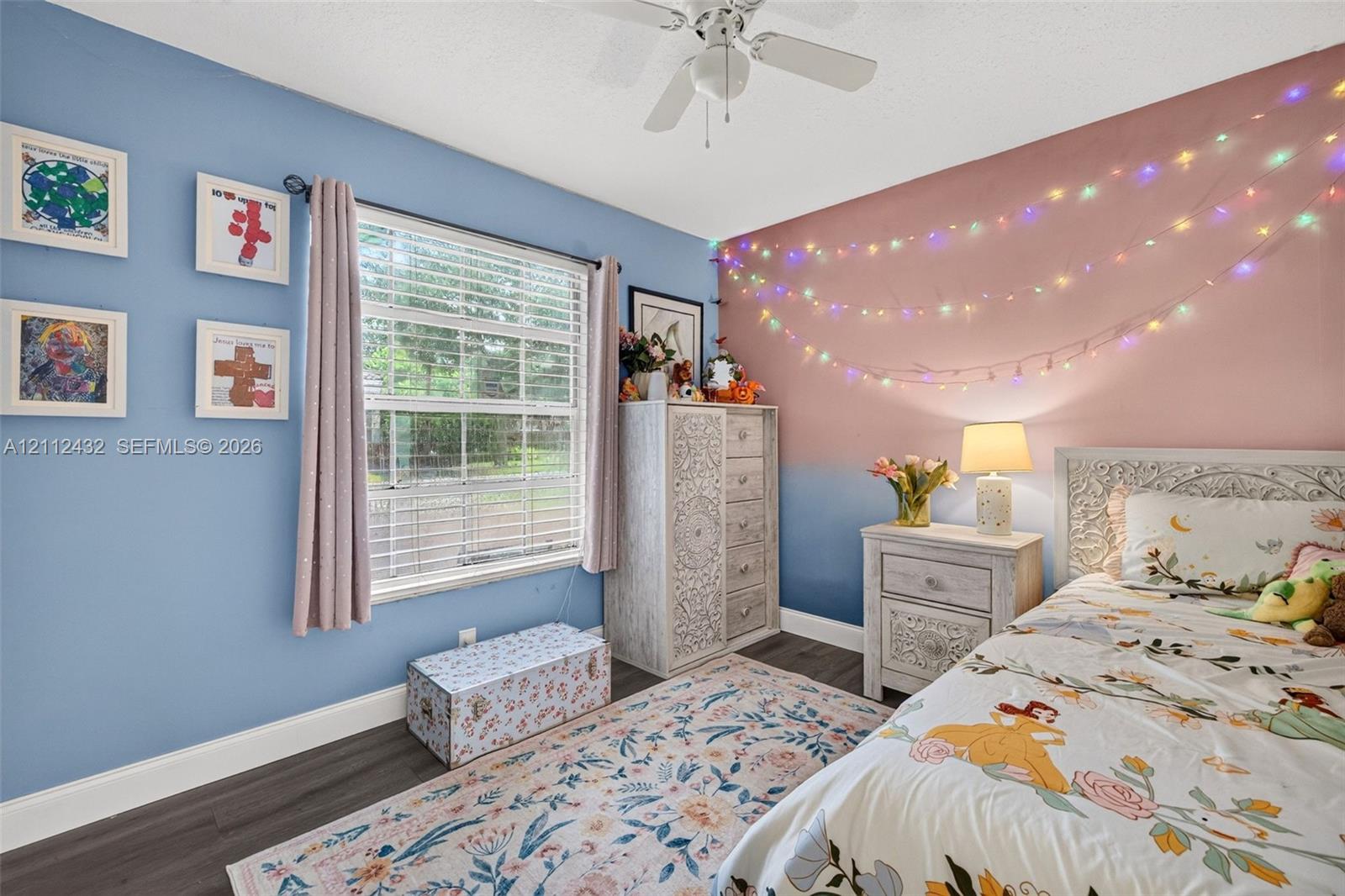 Room featuring wood-look flooring