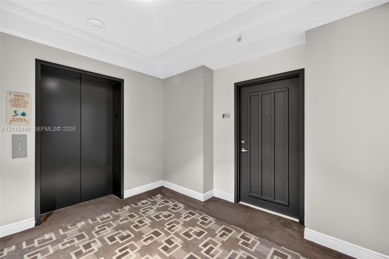 Entrance to the unit is right next to the elevator which takes you down to your parking space