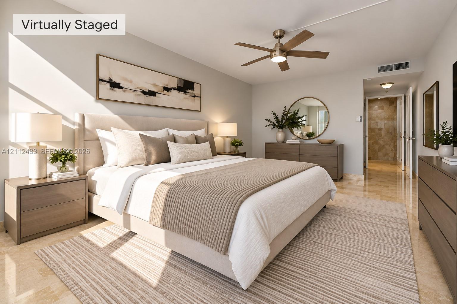 Polished stone flooring, brushed nickel ceiling fan with integrated lighting, and neutral wall tones