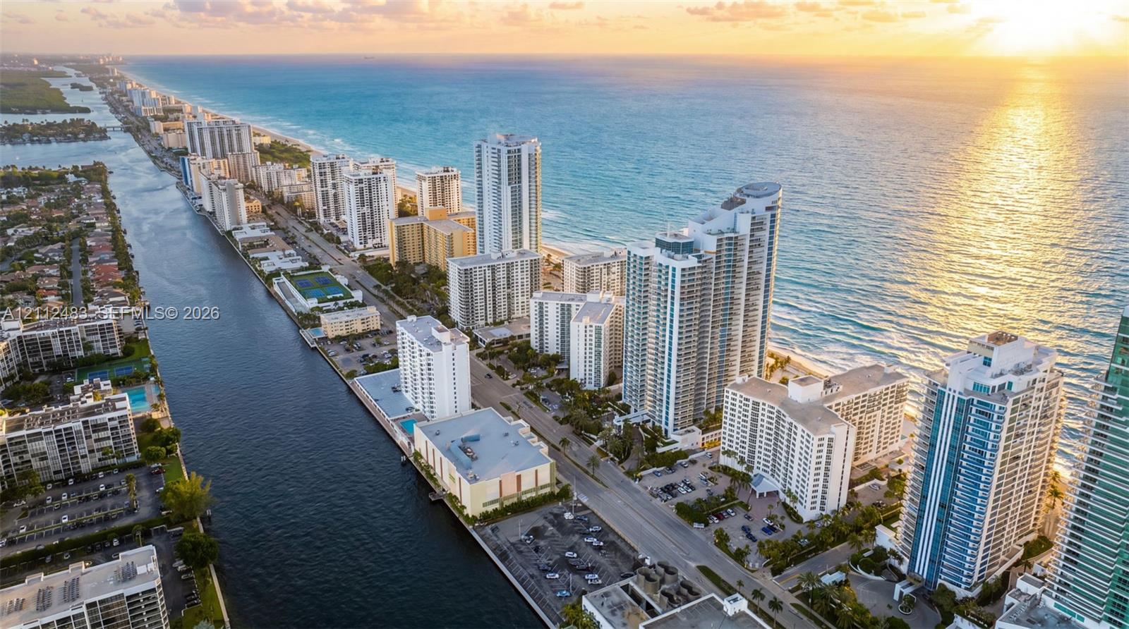 Aerial coastal perspective showcasing direct ocean frontage, expansive shoreline, and waterway proximity